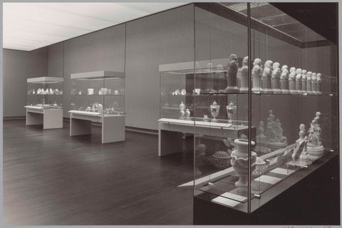 Room with various objects in display cases including busts, c. 1988 Canvas Print