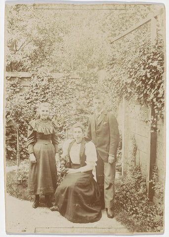 Woman, a girl and a boy posing in a garden, anonymous, 1892 - 1894 Canvas Print