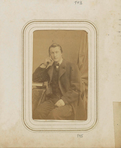 Portrait of a Man in a Long Coat, Leaning on a Pile of Books, Henri Pronk, c. 1863 - 1867 Canvas Print