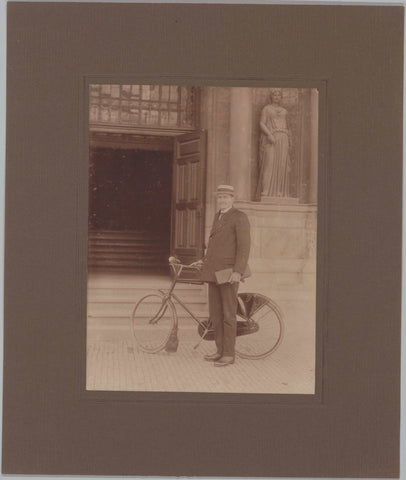 Mr. Van der Poel, posing with bicycle at an entrance, c. 1920 Canvas Print