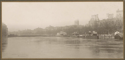 Very high water level in the Seine, in the background buildings on the northern riverbank, G. Dangereux, 1910 Canvas Print