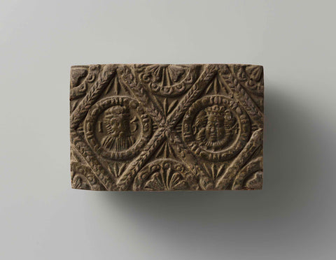 Fireplace stone of baked earth with diamond-shaped division, with two medallions with a man's head and woman's head and face, anonymous, 1594 Canvas Print