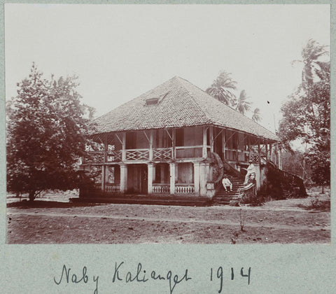 Two men in their white tropical suit sit on the sidewalk of a local house near Kalianget., Frits Freerks Fontein Fz. (attributed to), c. 1912 Canvas Print