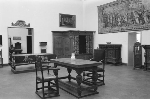 Room with furniture including a cupboard, tables, cot, tapestry and passage, 1952 Canvas Print