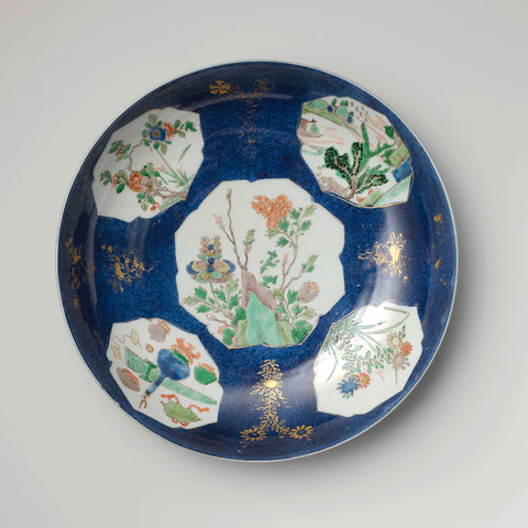 Saucer-dish with powder blue and panels in reserve with flower sprays, landscapes and precious objects, anonymous, c. 1700 - c. 1724 Canvas Print