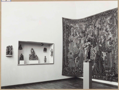 Room with tapestry, statue on pedestal and display case with statues, 1961 Canvas Print