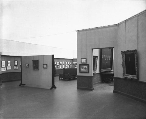 Room with drawings, etchings, paintings, a panel with three works and a passage on the right, 1932 Canvas Print