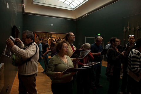 Visitors with in the background The skinny company, a passage and weapons, 2009 Canvas Print