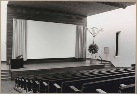 The Röellzaal with a view of the stage on which the lectern and a flower arrangement by Toon Leemans from Maastricht stand, c. 1969 Canvas Print