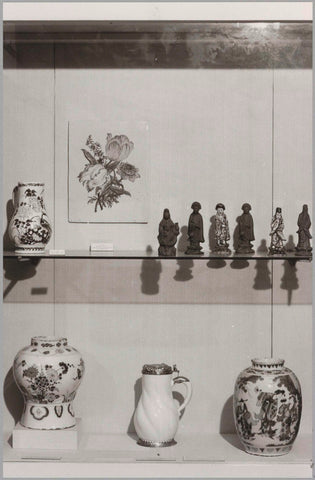 Display case with objects of Delft earthenware (polychrome) and figurines of red pottery, c. 1985 Canvas Print