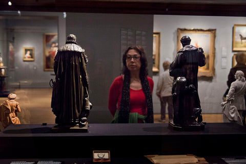 Visitor to a display case with sculptures at the Romatiek hall in the Netherlands 1800-1900 a few days after the reopening, 2013 Canvas Print