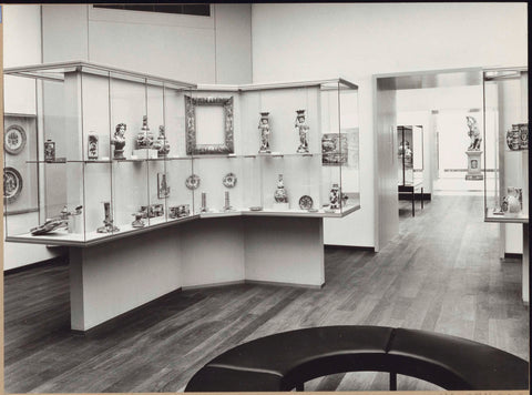 Octagonal room with Delft pottery in display cases, a round bench for visitors and a passage with a view of an image, 1962 Canvas Print