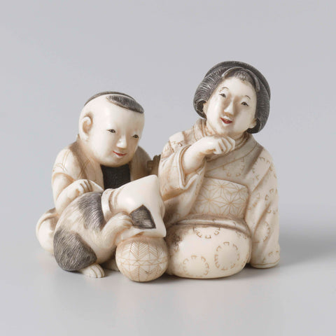 Netsuke in the form of a woman and child with a cat, Ryogyoku, c. 1775 - c. 1825 Canvas Print