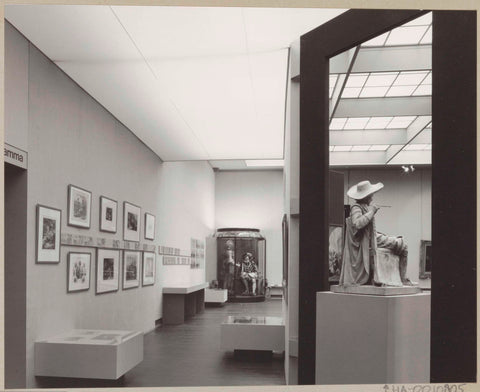 Room with various objects including prints, a statue, costumes, a harness and reclining information panels, c. 1978 Canvas Print