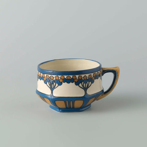 Cup, belonging to a tea set of chromolith stoneware, decorated in blue and yellow-brown, Villeroy & Boch Ceramic Werke K.G., c. 1911 - c. 1912 Canvas Print