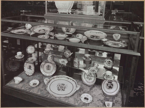 Display case with porcelain objects by Chine de commande, c. 1939 Canvas Print