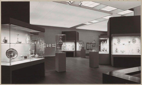 Room with silverware in display cases, front right two benches forming a corner, c. 1979 - c. 1980 Canvas Print