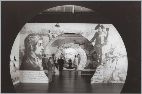 Room with people viewing a cannon in the midst of inflated reproductions of engravings, c. 1991 Canvas Print