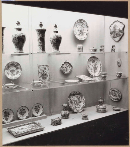 Display case with ceramic objects including pots, bowls, dishes and a tray, c. 1959 Canvas Print