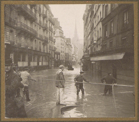 Men carry out a rescue action on the streets during the flood of Paris, G. Dangereux, 1910 Canvas Print