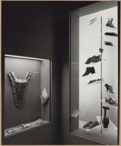 Showcases with textiles and leather objects including footwear and a small whale, 1962 Canvas Print