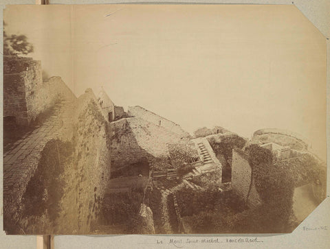 View of dilapidated buildings and a tower of Mont Saint-Michel, anonymous, c. 1880 - c. 1900 Canvas Print