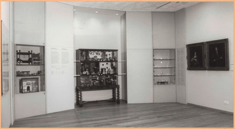 Doll's house between two display cases with various objects from doll's houses, c. 1994 Canvas Print