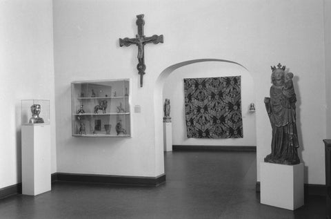 Room with Medieval Applied Arts: statues on pedestals, crucifix, display case and passage, 1953 Canvas Print