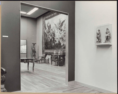 Room with two figurines in display case with a view to the room with tapestry, torchère, vase and furniture, 1962 Canvas Print