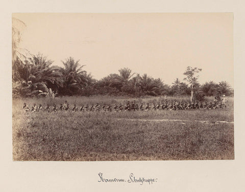 Schutztruppe of African soldiers and European officer in the field in Cameroon, anonymous, 1899 Canvas Print