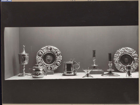 Display case with silver objects, c. 1957 Canvas Print