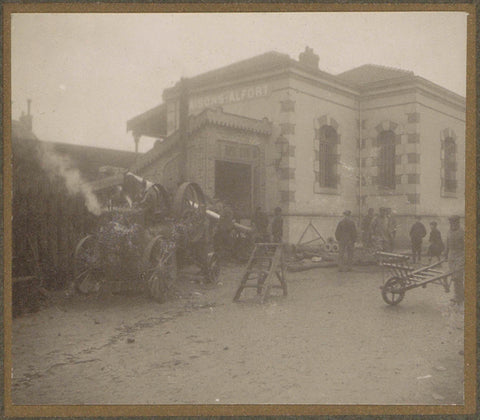 Men with wheelbarrows and a machine in front of the railway station of Maisons-Alfort during the flood of Paris, G. Dangereux, 1910 Canvas Print