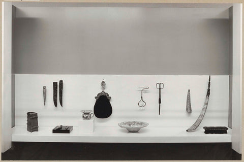 Display case with various objects including a bowl in the middle, 1971 Canvas Print