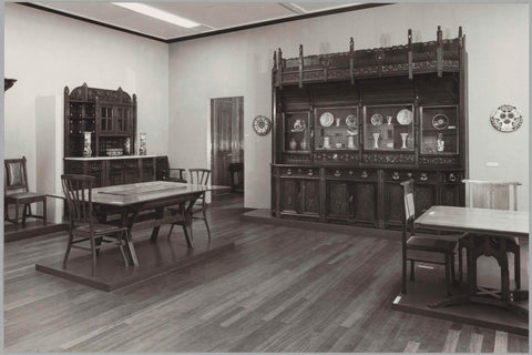 Room with furniture including chairs, tables, cupboards and a passageway, 1983 Canvas Print