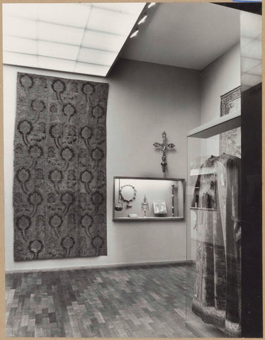 Room with tapestries, a crucifix and display cases with liturgical objects including a robe, 1961 Canvas Print