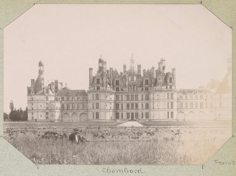 Castle of Chambord with in the foreground a man in a meadow, anonymous, c. 1890 - c. 1900 Canvas Print