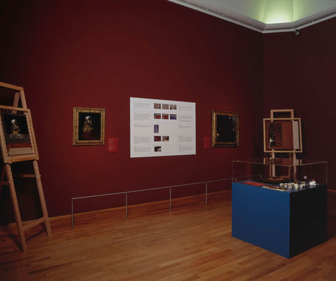 Room with various works, an information board and a display case with painting supplies, c. 2002 Canvas Print