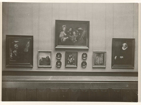 Room with paintings of the Utrecht school, including portraits, a church interior and a flower still life, 1928 Canvas Print