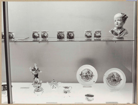 Display case with ceramic objects including a children's bust of Meissen porcelain, 1962 Canvas Print