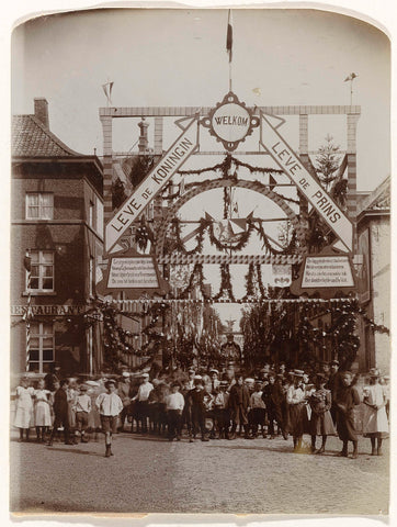 An arch of honour in a decorated street, on the occasion of the visit of Queen Wilhelmina and Prince Henry to the city of Roermond on Friday 17 July 1903, anonymous, 1903 Canvas Print