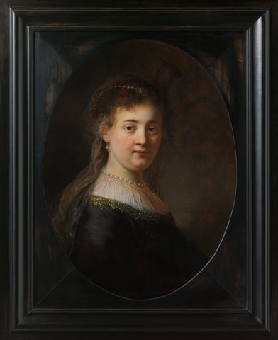 Young Woman in Fantasy Costume, Rembrandt van Rijn, 1633 Canvas Print