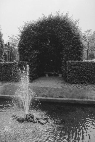 Pond with a bench behind it, 1990 Canvas Print