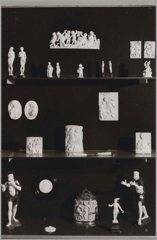 Display case with objects of Delft earthenware and other materials, c. 1985 Canvas Print