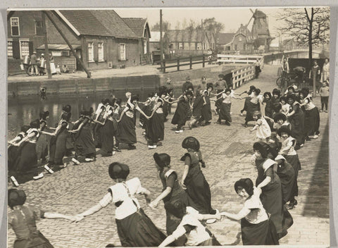 Girls in Bunschoter costume dancing in a circle, anonymous, 1930 Canvas Print