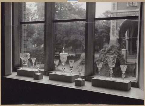 Engraved glasses on blocks in front of a window, on the left is a roemer, 1948 Canvas Print