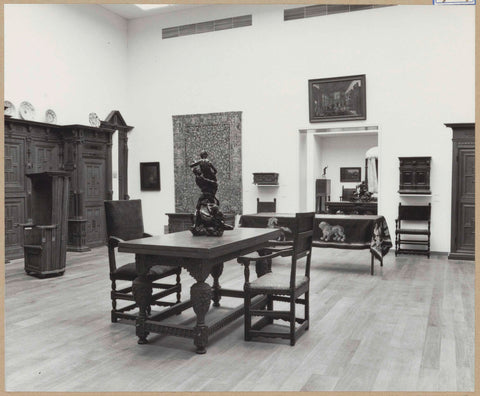 Room with table and chairs, panelling, cupboard, bedstead, statue and paintings, 1962 Canvas Print