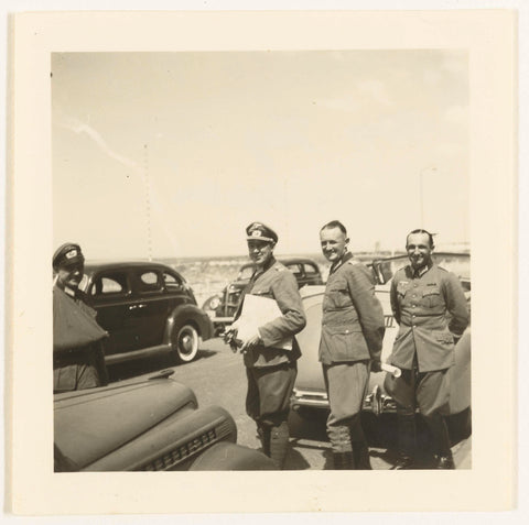 Four German soldiers with cars, anonymous, 1940 Canvas Print