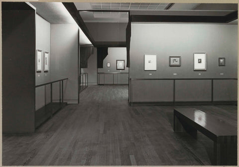 Room with various prints, a bench for visitors and a passage, c. 1969 Canvas Print