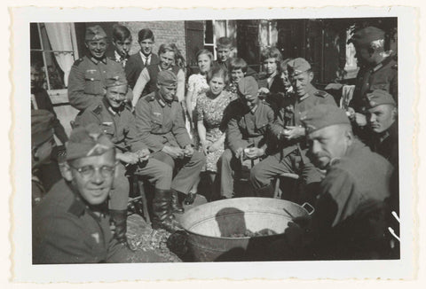 German soldiers peel potatoes., anonymous, 1940 Canvas Print