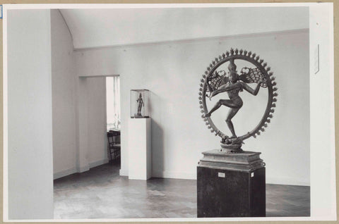 Image of Shiva Nataraja with a small statue in a display case to the left, 1952 Canvas Print